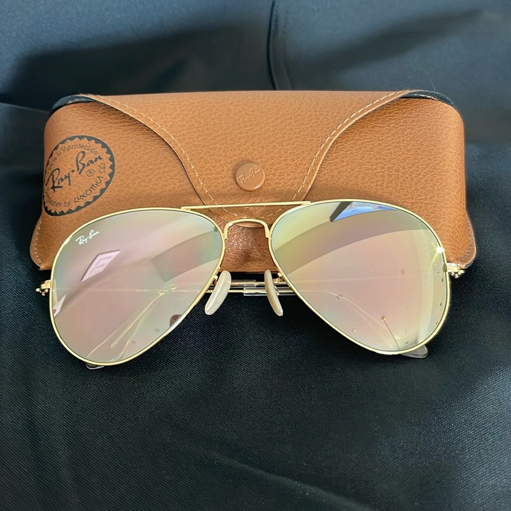 Ray-Ban Classic Women’s Aviators.   Gold rim with pale pink mirrored lenses.